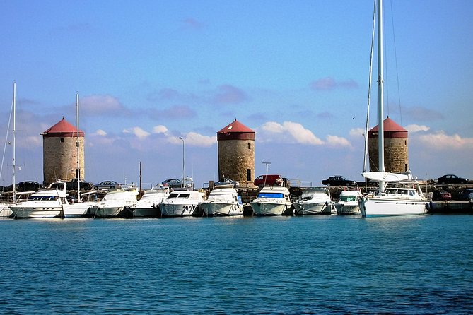 BEST OF RHODES ISLAND - PRIVATE TOUR - SHORE EXCURSION - FULL DAY - 4 People - Rhodes Town at First Light: Mandraki, the Annunciation Church, and Colossus Photos