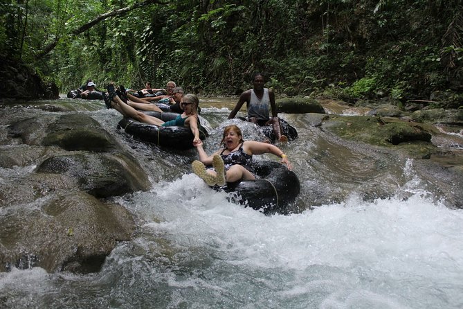Falmouth Shore Excursion: Dunns River Falls and River Tubing Tour - White River tubing: cool water, a guide with you, and real confidence-building