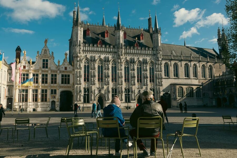 From Zeebrugge: Ghent and Bruges Shore Excursion - Entering Bruges through Market Square (where orientation happens fast)
