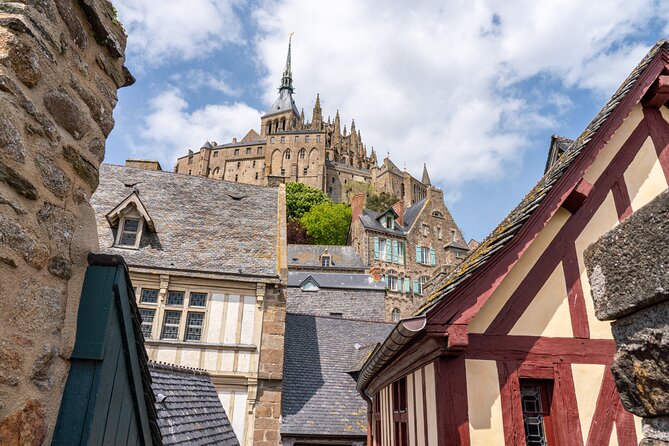 Mont St Michel Shore Excursion from Le Havre Guided Tour & Lunch - Guided lower-village walk: medieval streets without the stair stress
